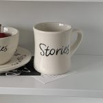 our stories mug
