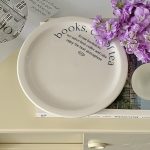 books, cup of tea plate
